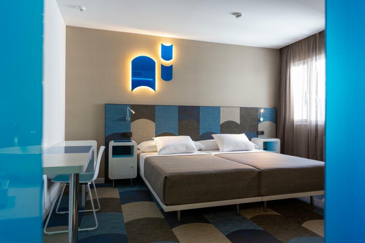 Habitación Doble con cama supletoria (2 adultos + 1 niño)